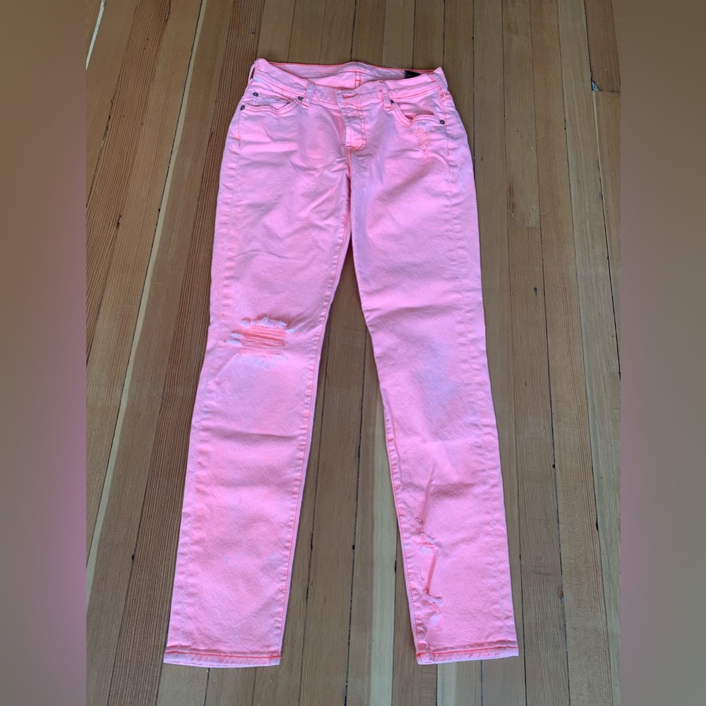 Seven fluorescent pink jeans